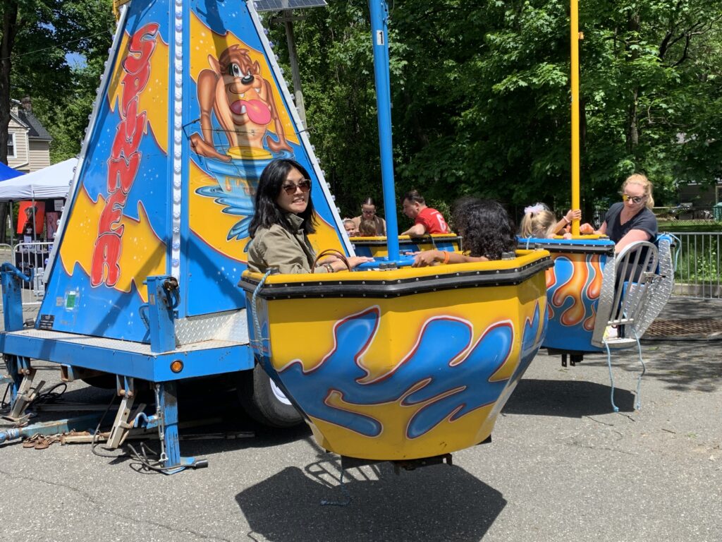 Holly and K on a ride spinning around